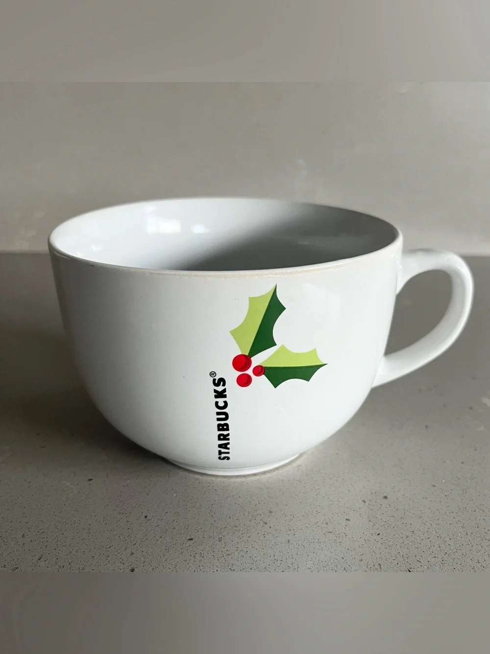 Starbucks holiday mug is in excellent condition. White oversized mug reads STARB